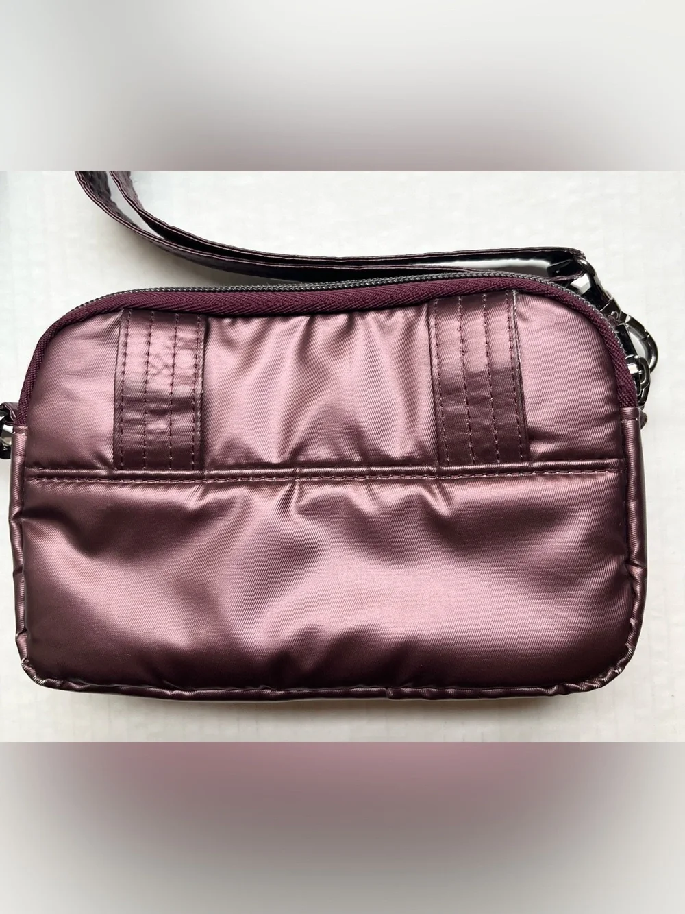 Lug Coupe Convertible Crossbody Bag with Basketweave Pattern in Purple/Plum.